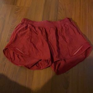 Red lululemon tall shorts